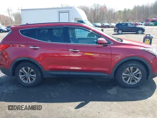 2014 Hyundai Santa Fe z VIN 5XYZUDLB3EG226857, wystawiony jako IAAI lot #41917762 z przebiegiem 42 677 mil mil oraz . Historia ofert i sprzedaży dostępna na DreamBid. Obrazek 13.