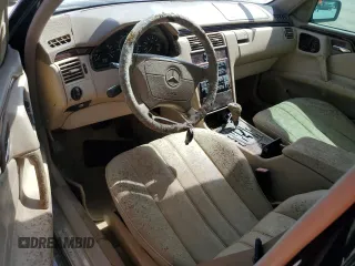 1998 Mercedes-Benz E-Class with VIN WDBJH65F2WA689599, listed as a Copart auction lot 76712344 with 0 mi miles and Salvage Title. Bid and sale history available at carsss.com. Image 8.