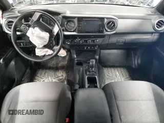 2019 Toyota Tacoma SR z VIN 5TFCZ5AN1KX196812, wystawiony jako Copart lot #51372065 z przebiegiem Nie podano mil oraz Szkoda całkowita • Salvage title. Historia ofert i sprzedaży dostępna na DreamBid. Obrazek 8.