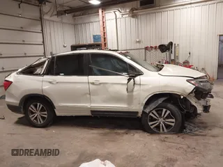 2016 Honda Pilot EX-L with VIN 5FNYF6H79GB019440, listed as a IAAI auction lot 41375747 with 199,535 mi miles. Bid and sale history available at carsss.com. Image 14.
