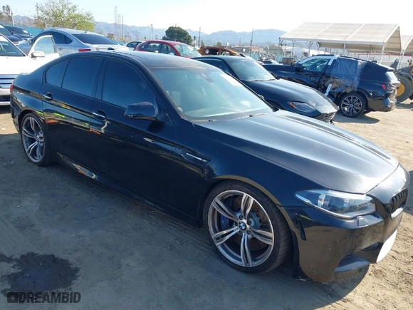 2014 BMW M5 with VIN WBSFV9C56ED097611, listed as a IAAI auction lot 41845196 with 72,215 mi miles. Bid and sale history available at carsss.com. Image 1.