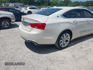 2014 Chevrolet Impala LTZ with VIN 1G1145SL9EU107666, listed as a IAAI auction lot 42147857 with 77,689 mi miles and . Bid and sale history available at DreamBid. Image 3.
