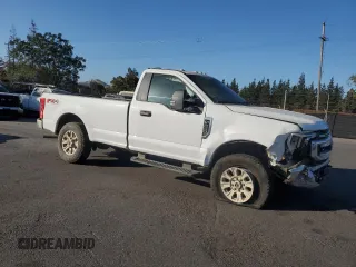 2022 Ford F-250 XL with VIN 1FTBF2B69NEE39910, listed as a Copart auction lot 73411214 with 16,123 mi miles and Salvage title. Bid and sale history available at DreamBid. Image 4.