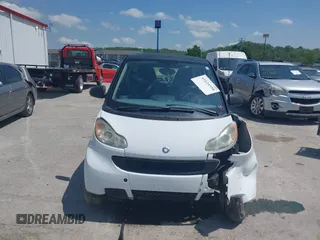 2009 Smart fortwo Pure with VIN WMEEJ31XX9K302737, listed as a IAAI auction lot 42124550 with 43,610 mi miles and . Bid and sale history available at DreamBid. Image 12.