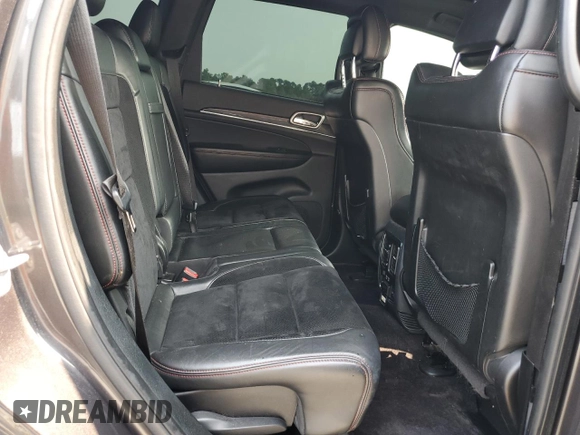 2017 Jeep Grand Cherokee Trailhawk with VIN 1C4RJFLT3HC614449, listed as a Copart auction lot 58559335 with 153,051 mi miles and Salvage title. Bid and sale history available at DreamBid. Image 11.