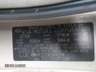 2004 Kia Spectra LX with VIN KNAFE121245064294, listed as a IAAI auction lot 41424241 with 110,136 mi miles. Bid and sale history available at carsss.com. Image 9.