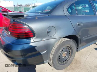 2004 Pontiac Grand Am SE with VIN 1G2NE52F54M560234, listed as a IAAI auction lot 41716361 with 256,571 mi miles. Bid and sale history available at carsss.com. Image 14.