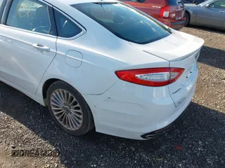 2013 Ford Fusion Titanium with VIN 3FA6P0K90DR248360, listed as a IAAI auction lot 42141987 with 999,999 mi miles. Bid and sale history available at carsss.com. Image 6.