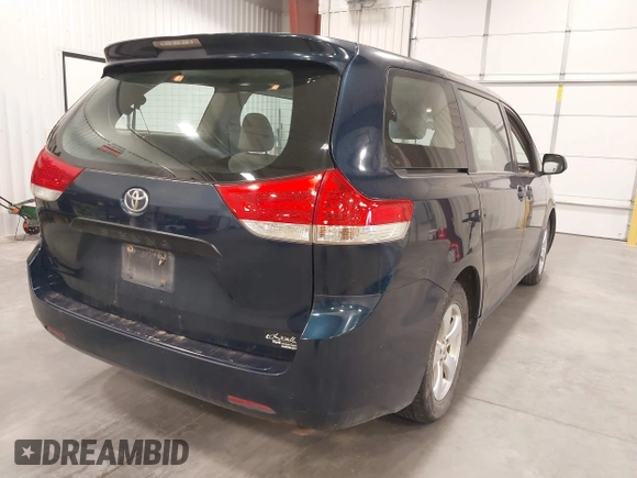 2011 Toyota Sienna with VIN 5TDZK3DC8BS125884, listed as a IAAI auction lot 41998890 with 249,193 mi miles. Bid and sale history available at carsss.com. Image 4.