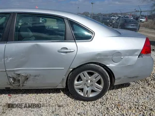 2013 Chevrolet Impala LT with VIN 2G1WG5E36D1235835, listed as a IAAI auction lot 41866890 with 121,742 mi miles and . Bid and sale history available at DreamBid. Image 12.
