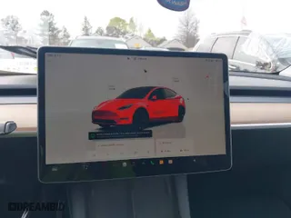 2022 Tesla Model Y Long Range with VIN 7SAYGDEE2NA018499, listed as a IAAI auction lot 41463821 with 33,921 mi miles. Bid and sale history available at carsss.com. Image 18.