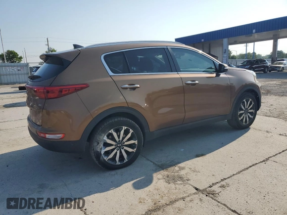 2017 Kia Sportage EX with VIN KNDPNCAC9H7054281, listed as a Copart auction lot 60571945 with 106,516 mi miles and Salvage title. Bid and sale history available at DreamBid. Image 3.