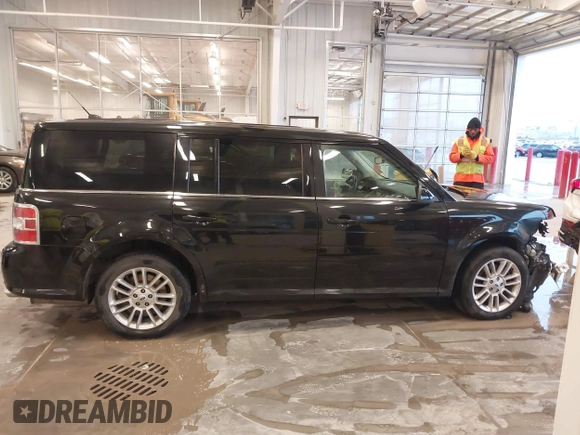 2014 Ford Flex SEL z VIN 2FMGK5C82EBD10529, wystawiony jako IAAI lot #41464375 z przebiegiem 95 528 mil mil oraz . Historia ofert i sprzedaży dostępna na DreamBid. Obrazek 13.