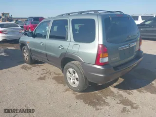 2004 Mazda Tribute ES with VIN 4F2CZ06184KM32333, listed as a IAAI auction lot 42041183 with 33,646 mi miles. Bid and sale history available at carsss.com. Image 3.