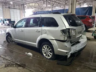 2013 Dodge Journey SXT with VIN 3C4PDCBB7DT618167, listed as a Copart auction lot 45284625 with 188,534 mi miles and Salvage Title. Bid and sale history available at carsss.com. Image 2.