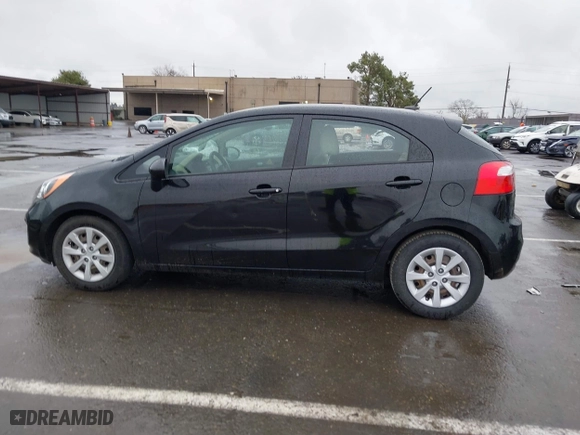 2013 Kia Rio LX with VIN KNADM5A35D6302623, listed as a IAAI auction lot 41626083 with 114,132 mi miles. Bid and sale history available at carsss.com. Image 14.