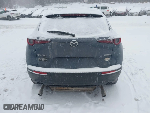 2023 Mazda CX-30 S Preferred z VIN 3MVDMBCM4PM574509, wystawiony jako IAAI lot #41522283 z przebiegiem 21 507 mil mil oraz . Historia ofert i sprzedaży dostępna na DreamBid. Obrazek 16.