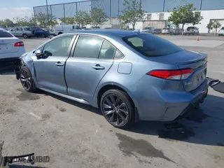 2024 Toyota Corolla Hybrid LE with VIN JTDBCMFE7RJ023311, listed as a IAAI auction lot 42051893 with 18,607 mi miles. Bid and sale history available at carsss.com. Image 3.