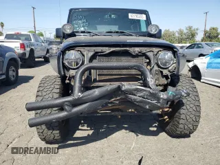 2017 Jeep Wrangler Sport z VIN 1C4GJWAG4HL753650, wystawiony jako Copart lot #62790205 z przebiegiem 52 550 mil mil oraz Szkoda całkowita • Salvage title. Historia ofert i sprzedaży dostępna na DreamBid. Obrazek 5.