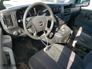 2019 GMC Savana Cargo Van with VIN 1GTW7AFGXK1316440, listed as a Copart auction lot 57411764 with 60,298 mi miles and Salvage Title. Bid and sale history available at carsss.com. Image 8.