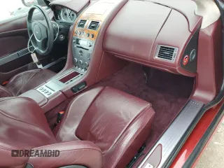 2005 Aston Martin DB9 z VIN SCFAD01A15GA00012, wystawiony jako Copart lot #65919164 z przebiegiem Nie podano mil oraz Szkody całkowita. Historia ofert i sprzedaży dostępna na DreamBid. Obrazek 8.