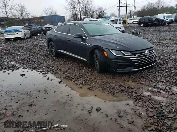 2020 Volkswagen Arteon SEL R-Line z VIN WVWSR7AN1LE014417, wystawiony jako Copart lot #82115513 z przebiegiem 22 494 mil mil oraz . Historia ofert i sprzedaży dostępna na DreamBid. Obrazek 11.