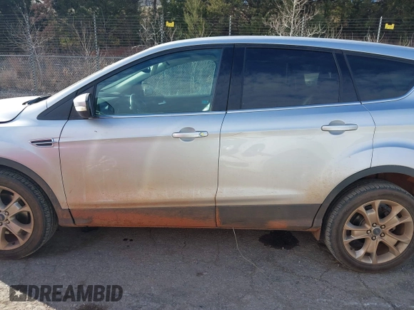 2013 Ford Escape SEL with VIN 1FMCU9H92DUD87086, listed as a IAAI auction lot 41614977 with 100,478 mi miles and . Bid and sale history available at DreamBid. Image 15.