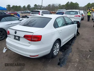 2015 Volkswagen Jetta Sedan 1.8T SE with VIN 3VWD17AJXFM334862, listed as a IAAI auction lot 42039243 with 94,996 mi miles. Bid and sale history available at carsss.com. Image 4.