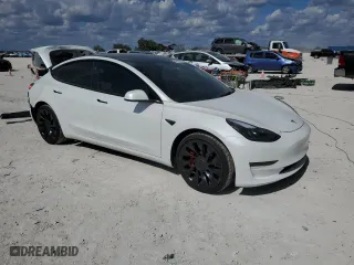2022 Tesla Model 3 Performance with VIN 5YJ3E1EC0NF330558, listed as a Copart auction lot 44438365 with 19,690 mi miles and Salvage Title. Bid and sale history available at carsss.com. Image 4.