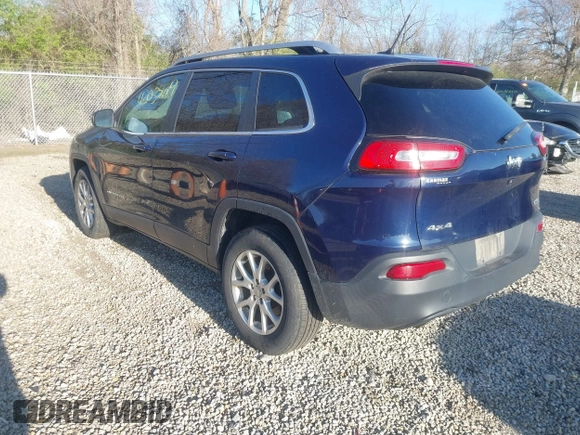 2015 Jeep Cherokee Latitude with VIN 1C4PJMCB1FW709560, listed as a IAAI auction lot 42035619 with 162,354 mi miles. Bid and sale history available at carsss.com. Image 3.