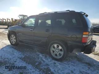 2001 GMC Yukon Denali с VIN 1GKEK63U01J253479, выставлен на аукционе Copart как лот 83272054 с пробегом 217 364 миль миль и Чистый • Clean title. История ставок и продаж доступна на DreamBid. Изображение 2.