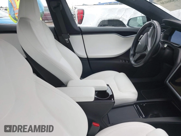2021 Tesla Model S Long Range Plus with VIN 5YJSA1E21MF425482, listed as a IAAI auction lot 41886030 with Not provided miles and . Bid and sale history available at DreamBid. Image 5.
