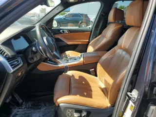 2020 BMW X5 M50i with VIN 5UXJU4C00L9C54563, listed as a Copart auction lot 56119764 with 65,963 mi miles. Bid and sale history available at carsss.com. Image 7.