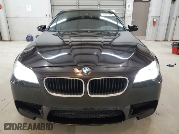 2013 BMW M5 z VIN WBSFV9C5XDC772672, wystawiony jako Copart lot #53732175 z przebiegiem 83 665 mil mil oraz Tytuł czysty. Historia ofert i sprzedaży dostępna na DreamBid. Obrazek 5.