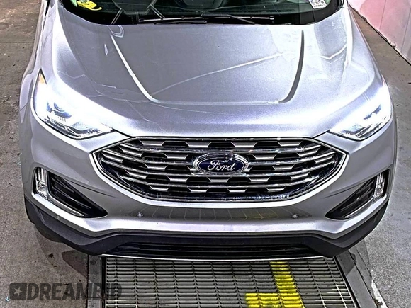 2020 Ford Edge Titanium with VIN 2FMPK3K95LBA30678, listed as a IAAI auction lot 42714178 with 60,935 mi miles and . Bid and sale history available at DreamBid. Image 7.