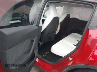 2024 Tesla Model Y Long Range with VIN 7SAYGDEE8RA232709, listed as a IAAI auction lot 41724484 with 5,376 mi miles and . Bid and sale history available at DreamBid. Image 8.