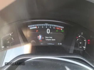 2018 Honda CR-V Touring z VIN 7FARW2H94JE077885, wystawiony jako Copart lot #55451345 z przebiegiem 133 964 mil mil oraz Szkoda całkowita • Salvage title. Historia ofert i sprzedaży dostępna na DreamBid. Obrazek 9.