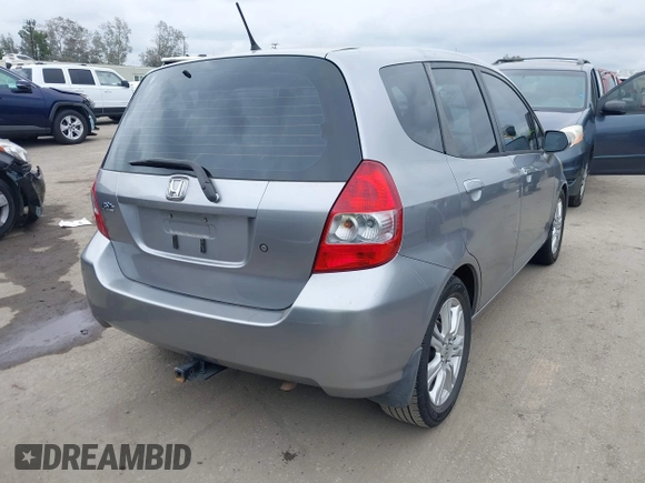 2007 Honda Fit with VIN JHMGD37467S065669, listed as a IAAI auction lot 42078795 with 124,030 mi miles. Bid and sale history available at carsss.com. Image 4.