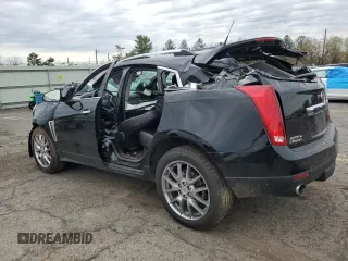 2014 Cadillac SRX Premium Collection z VIN 3GYFNGE31ES688270, wystawiony jako Copart lot #52795245 z przebiegiem 134 103 mil mil oraz Szkoda całkowita • Salvage title. Historia ofert i sprzedaży dostępna na DreamBid. Obrazek 2.