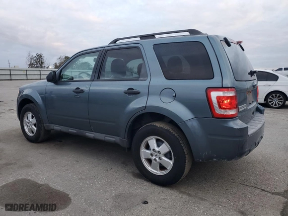 2010 Ford Escape XLT with VIN 1FMCU0DG2AKD33309, listed as a Copart auction lot 51435245 with 120,638 mi miles and Salvage Title. Bid and sale history available at carsss.com. Image 2.