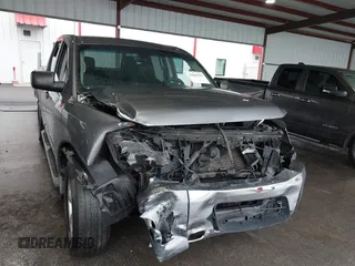 2014 Nissan Titan S with VIN 1N6AA0ECXEN504034, listed as a IAAI auction lot 39883492 with 189,529 mi miles and . Bid and sale history available at DreamBid. Image 6.