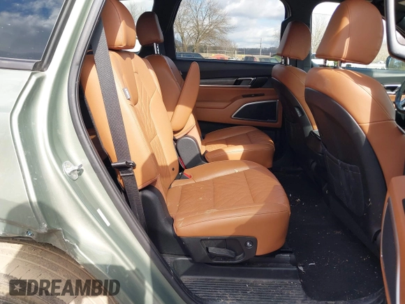 2023 Kia Telluride EX X-Line z VIN 5XYP3DGC8PG338845, wystawiony jako IAAI lot #41665367 z przebiegiem 63 595 mil mil oraz . Historia ofert i sprzedaży dostępna na DreamBid. Obrazek 8.