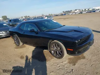 2023 Dodge Challenger SXT with VIN 2C3CDZAG0PH597128, listed as a IAAI auction lot 40865123 with 9,362 mi miles. Bid and sale history available at carsss.com. Image 1.