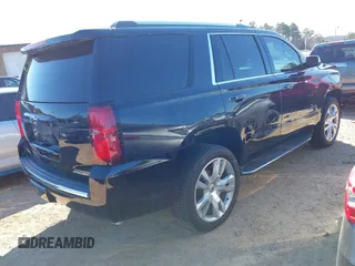 2020 Chevrolet Tahoe LTZ with VIN 1GNSCCKCXLR106732, listed as a IAAI auction lot 41486660 with Not provided miles and . Bid and sale history available at DreamBid. Image 4.