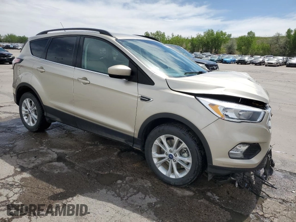 2018 Ford Escape SE z VIN 1FMCU9GD5JUC08024, wystawiony jako Copart lot #56531105 z przebiegiem 54 104 mil mil oraz Szkoda całkowita • Salvage title. Historia ofert i sprzedaży dostępna na DreamBid. Obrazek 4.
