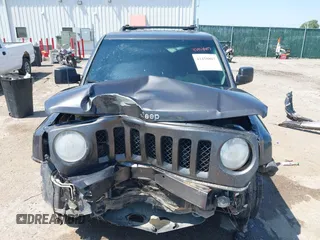 2014 Jeep Patriot Latitude with VIN 1C4NJRFB4ED799037, listed as a IAAI auction lot 42458807 with 105,936 mi miles and . Bid and sale history available at DreamBid. Image 13.