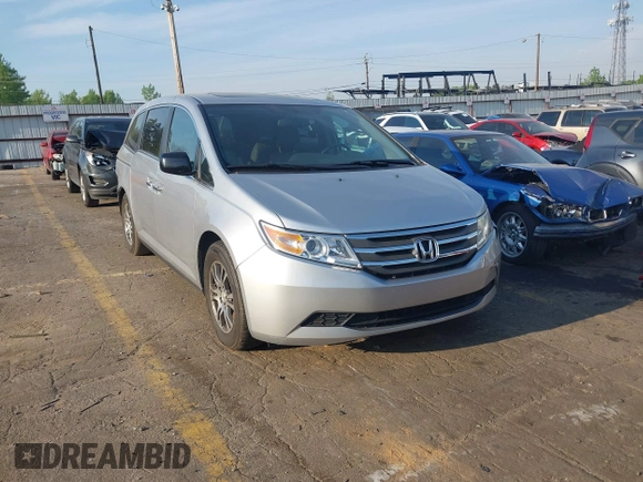 2013 Honda Odyssey EX-L with VIN 5FNRL5H6XDB084016, listed as a IAAI auction lot 42044300 with 156,296 mi miles and . Bid and sale history available at carsss.com. Image 1.