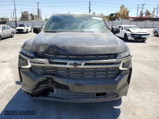 2022 Chevrolet Suburban RST with VIN 1GNSCEKD7NR176874, listed as a Copart auction lot 67539544 with 73,624 mi miles and Salvage Title. Bid and sale history available at carsss.com. Image 5.