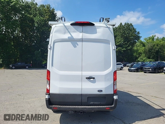 2023 Ford Transit Cargo with VIN 1FTBR1X87PKC01635, listed as a IAAI auction lot 42832727 with 17,348 mi miles and . Bid and sale history available at DreamBid. Image 32.