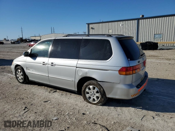 2003 Honda Odyssey EX-L with VIN 5FNRL18943B157513, listed as a Copart auction lot 47135305 with 199,079 mi miles and Salvage Title. Bid and sale history available at DreamBid. Image 2.